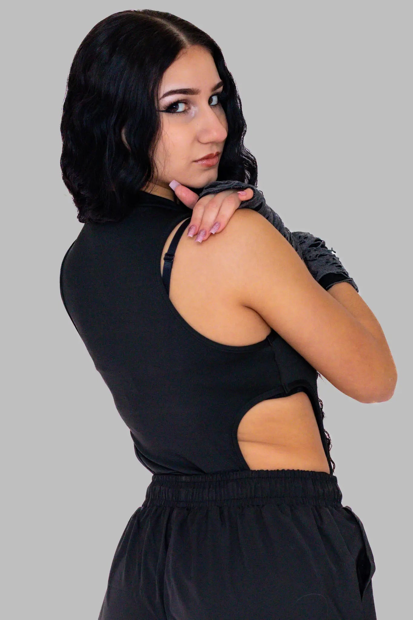 Cutout Bodysuit: Schwarzer Rave Bodysuit Bild von hinten